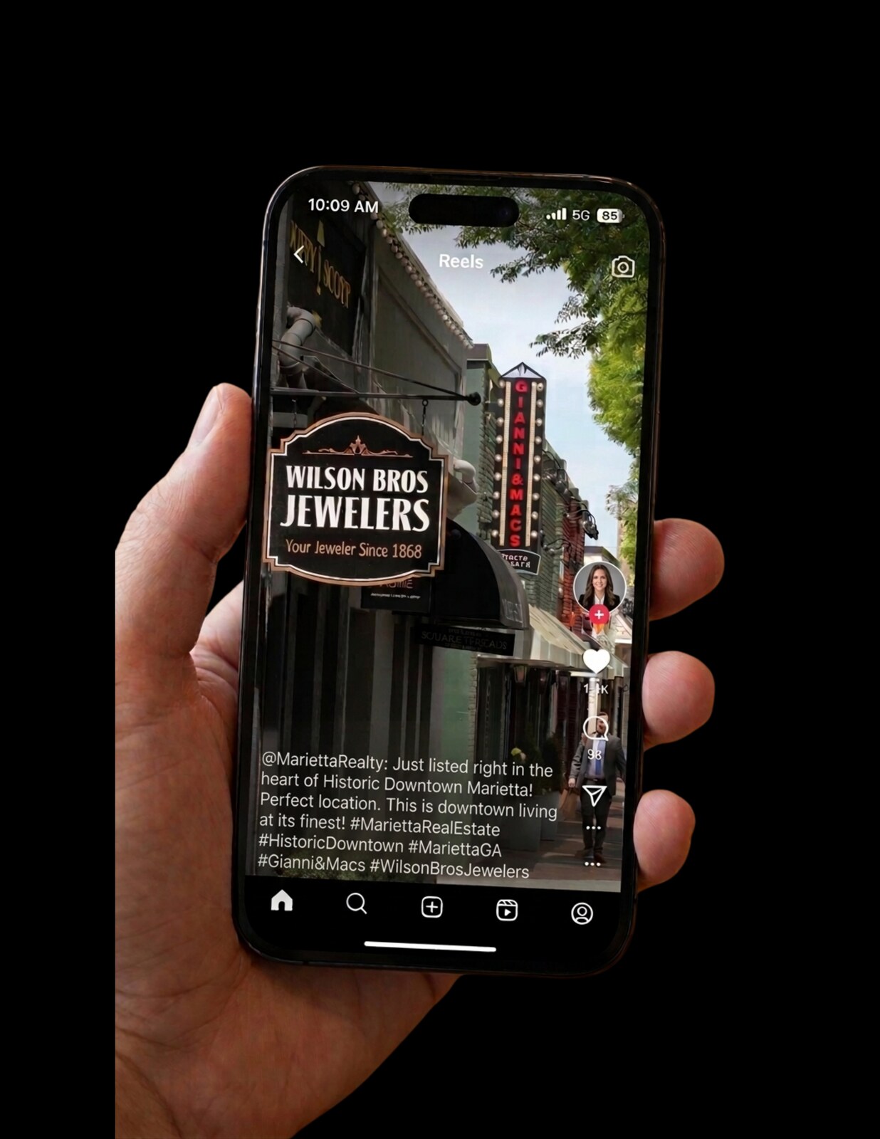 A My Town Reels clip of historic downtown Marietta playing in a social feed